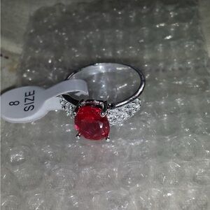 Elegant Silver and Red Gemstone Ring